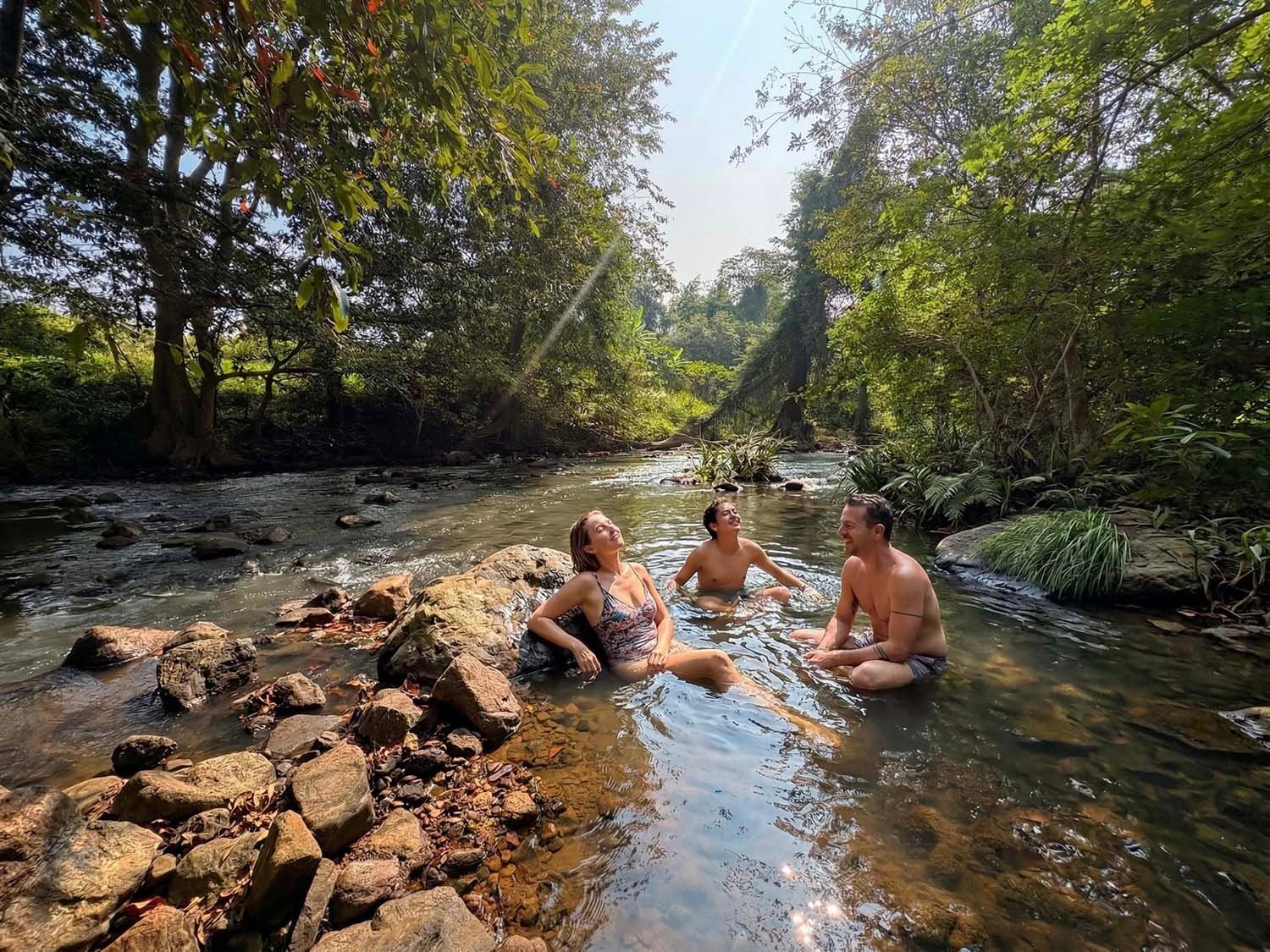 Guests enjoying natural river bathing at Mastodon Valley